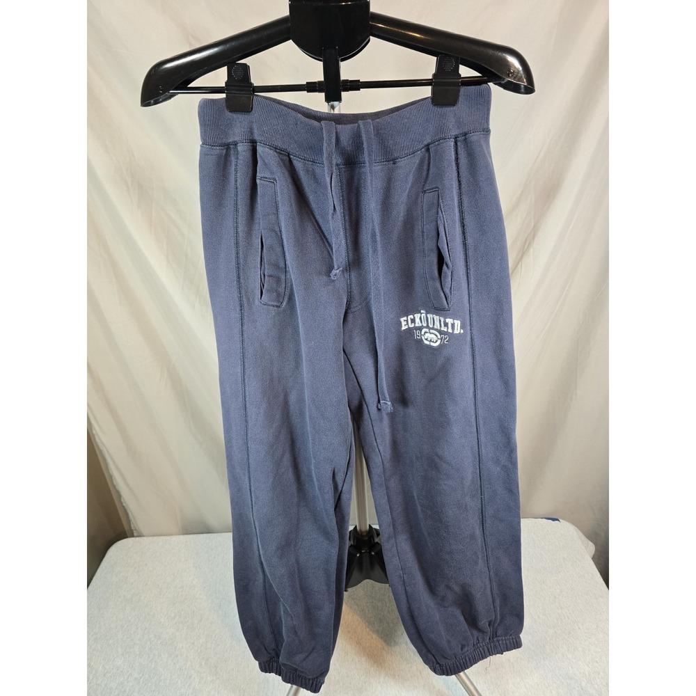 Ecko Unltd brand navy blue jogger sweatpants featuring a drawstring waistband...